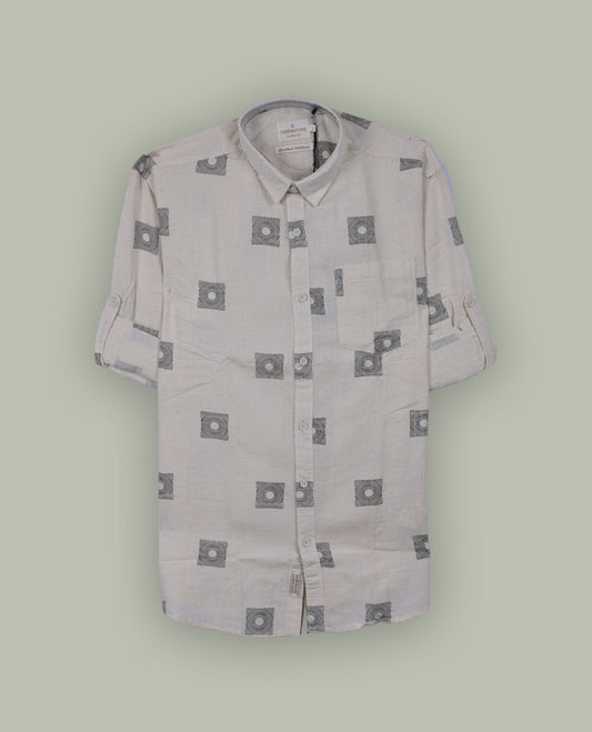 Off white colour shirt adorned with minimal black geometric square prints, Features a classic collar, full sleeves, and a front pocket & perfect for a relaxed yet refined casual look.