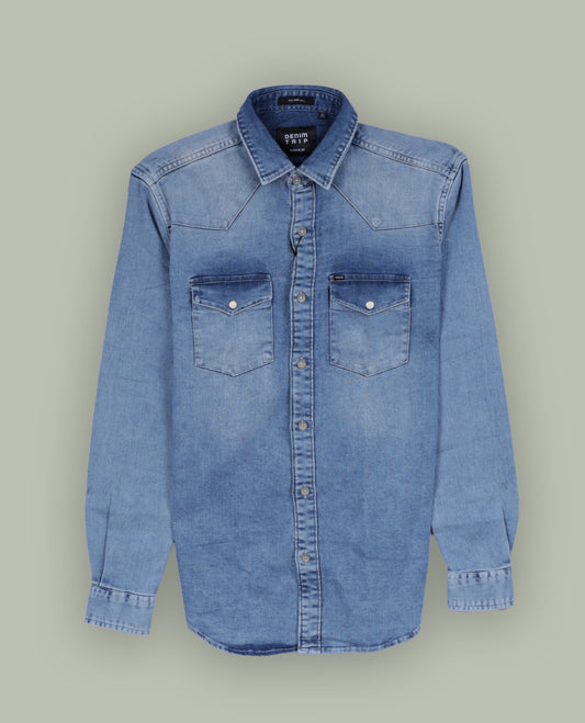 Light blue colour denim shirt with a faded wash finish, Features two front flap pockets, button down closure, and long sleeves with cuffs, Perfect for a rugged yet casual look.