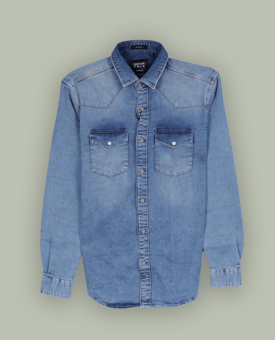 Light blue colour denim shirt with a faded wash finish, Features two front flap pockets, button down closure, and long sleeves with cuffs, Perfect for a rugged yet casual look.