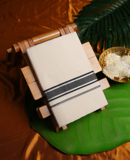 Cream colour MCR double dhoti featuring black and silver colour kasavu zari border