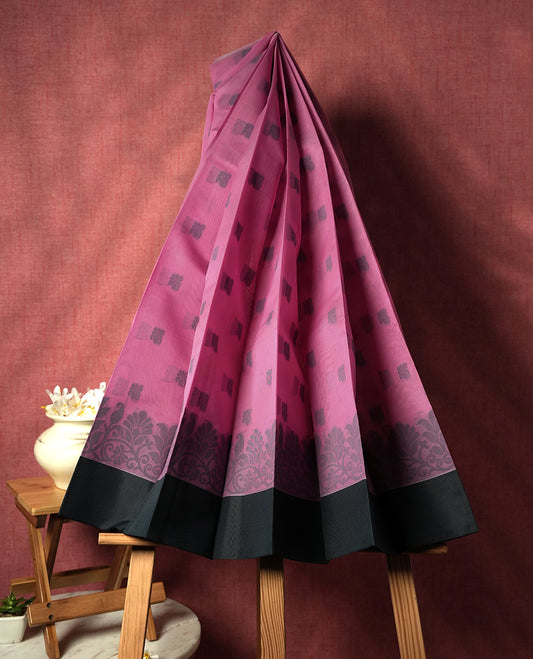 Wild Orchid Pink colour silk cotton saree adorned with delicate woven motifs all over the body, paired with an elegant dark plain border and richly patterned pallu & Comes with a matching blouse piece for a complete ethnic look.
