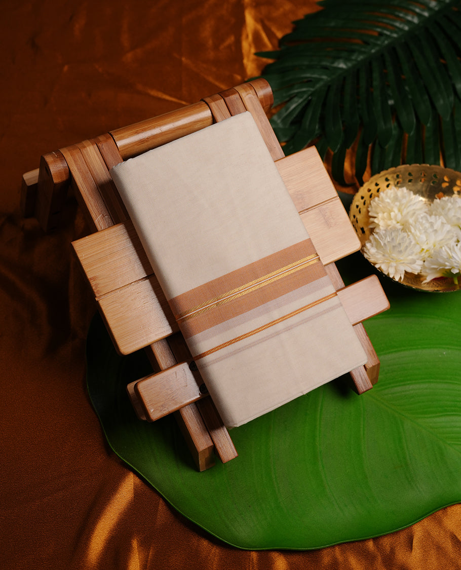 Cream colour cotton double dhoti featuring sandal colour border with gold zari border