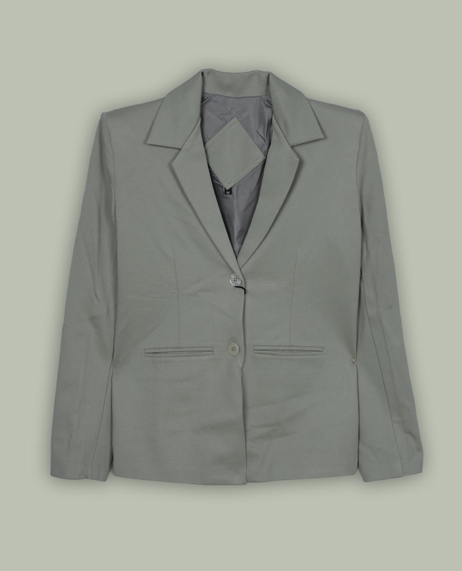 Light pastel green colour blazer featuring a notched lapel collar, button-front closure and flap pockets, finished with long sleeves and a tailored silhouette.