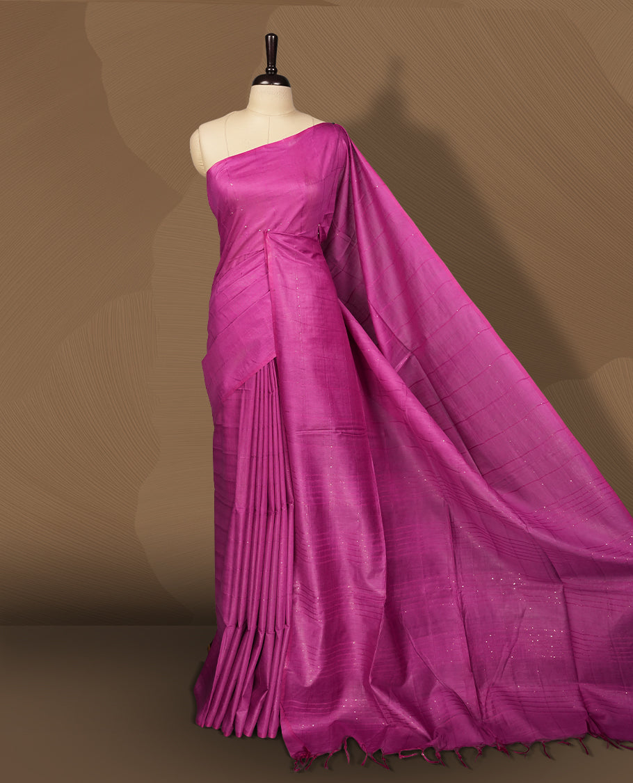 Dark Raspberry colour semi jute saree with vertical striped pattern sequins for a modern appeal , Soft texture, sleek border, tassel pallu, & Includes matching blouse piece for a complete look.