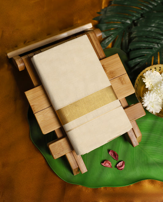 Classic off white cotton double dhoti enhanced with a broad golden zari border, offering a timeless and regal traditional look, perfect for weddings, festive occasions, and cultural ceremonies.