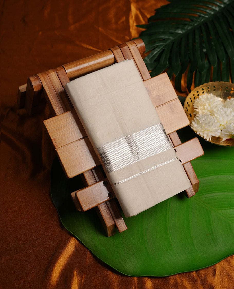 Cream colour cotton double dhoti featuring silver stripe kasavu zari border