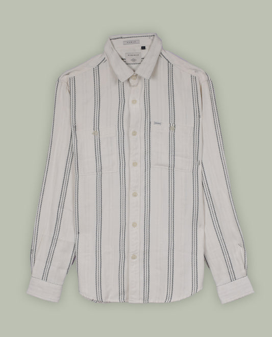 Cream colour shirt with pastel green vertical stripes, crafted in soft cotton for all day comfort, Featuring full sleeves, dual chest pockets, and a classic collar, it delivers a bold yet timeless casual style.