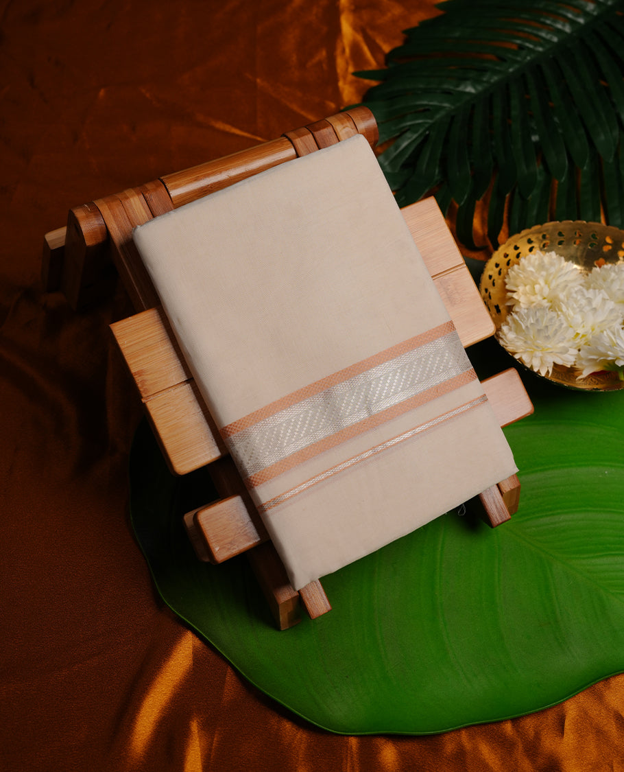 Cream colour RAMRAJ cotton double dhoti featuring Light brown colour zari border