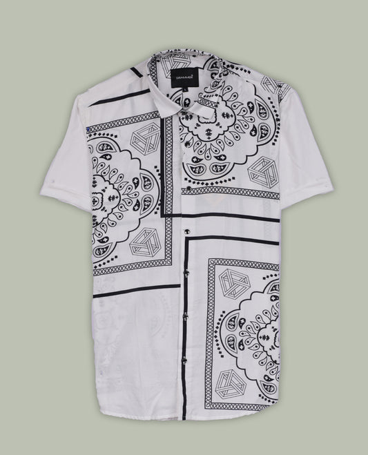 White colour shirt adorned with elegant black colour floral prints, Designed with a classic collar and short sleeves, this timeless piece offers a crisp and casual look, perfect for both work and weekend wear.