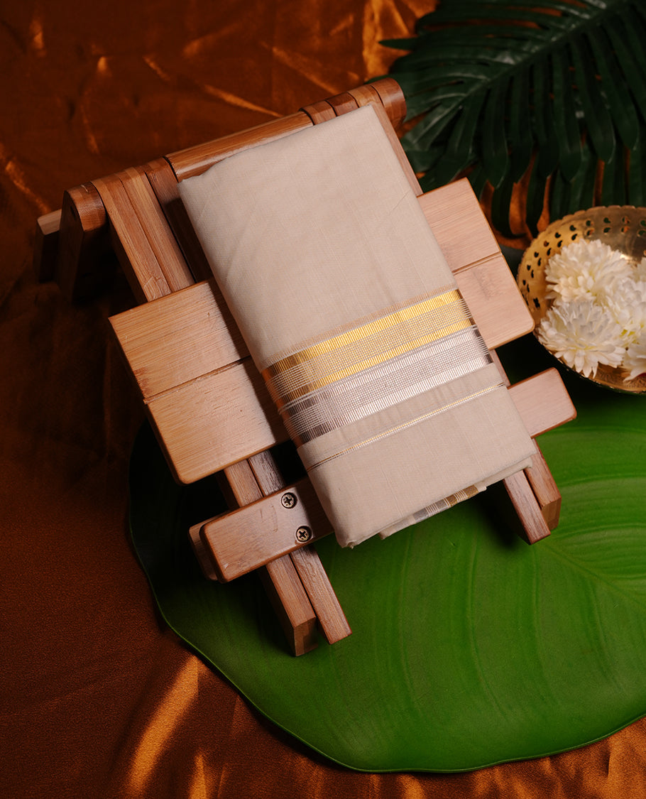 Cream colour cotton double dhoti featuring gold and silver border