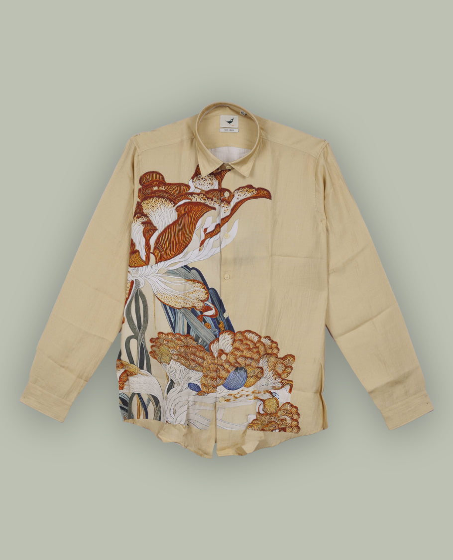 Beige colour shirt adorned with bold floral artwork in earthy tones, Crafted with a classic collar and full sleeves, it merges artistic expression with everyday elegance.