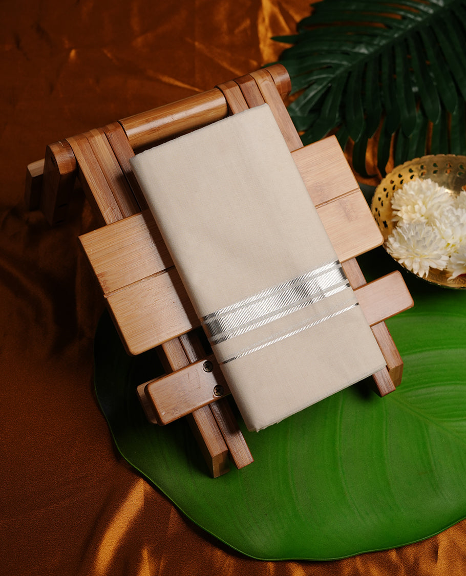 Cream colour cotton double dhoti featuring silver stripe kasavu zari border