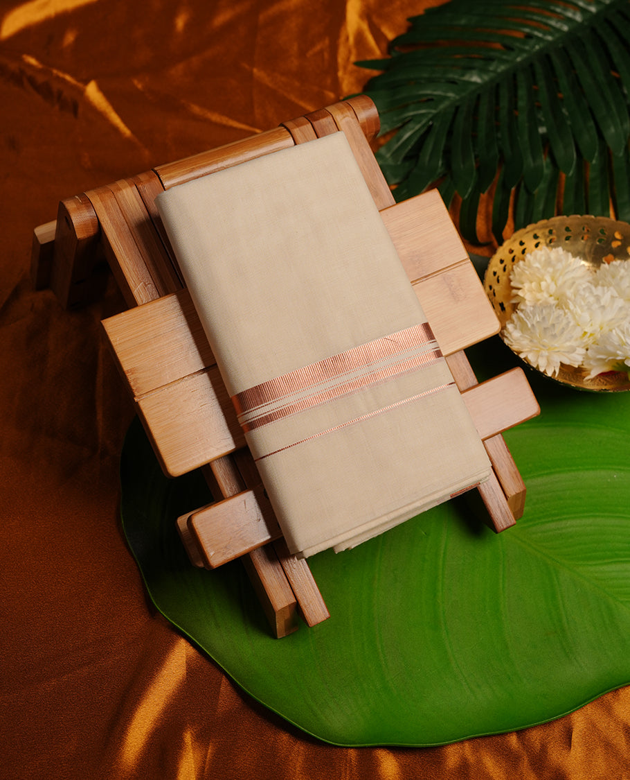 Cream colour cotton double dhoti featuring copper border