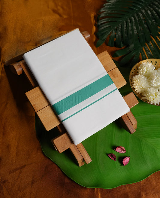 White colour cotton dhoti with a striking aqua green border, combining simplicity with a refreshing touch of tradition & Perfect for cultural events, temple wear, and festive celebrations.