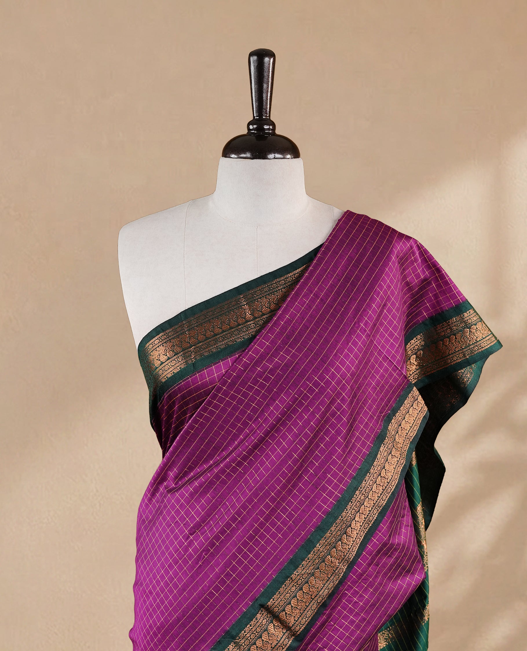 Grape colour kalyani cotton saree featuring gold zari check pattern on body, complemented by Green colour with Antique zari border, paired with matching blouse piece.