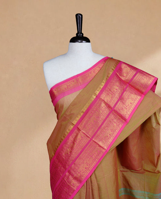 Olive Colour Chettinad cotton saree featuring elegant plain body , complemented by contrast Magenta colour with traditional border, comes with matching blouse piece.
