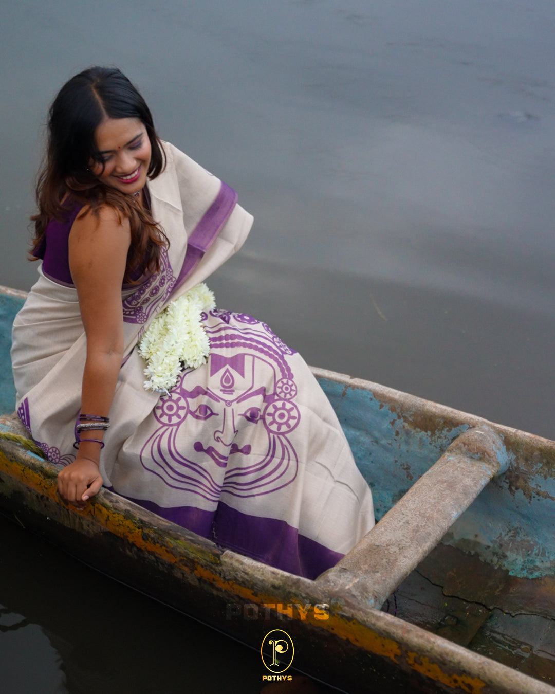 Golden Cream colour Tissue Saree featuring Purple Kathakali printed with contrast Purple border, Comes with Contrast Self Printed Blouse.