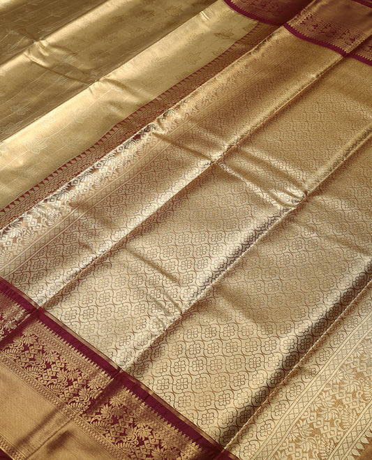 Golden Colour Art Tissue Saree having Flower Work in Body with Maroon Colour Border and Blouse