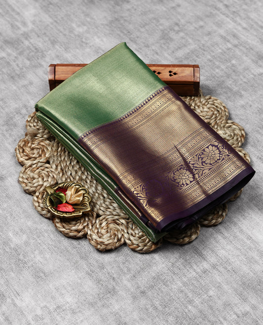 Pastel Green Colour Art Tissue Saree having Plain Body with Dark Purple Border and Blouse