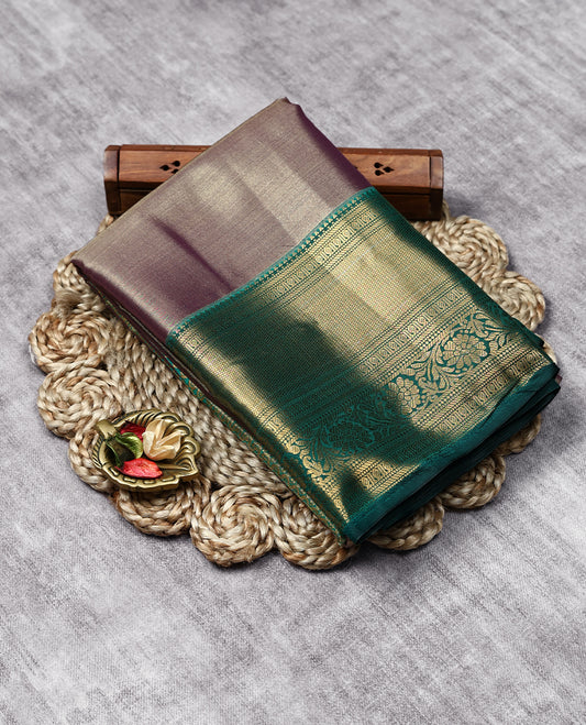 Pastel Violet Colour Art Tissue Saree having Plain Body with Dark Green Border and Blouse