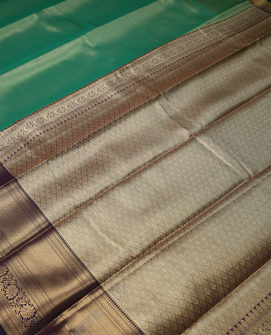 Fern Green Colour Art Tissue Saree having Plain Body with Dark Grape Colour Border and Blouse