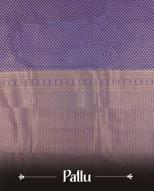 Blue colour semi silk brocade saree featuring intricate Gold patterns across the body, complemented by a Self colour woven border and pallu, paired with a matching blouse.