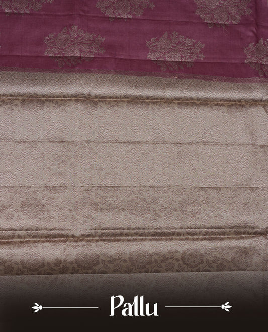 Mauve colour pure banaras tusser silk saree highlighting antique zari pattern across body, with contrast cream colour with zari border and paired with matching blouse