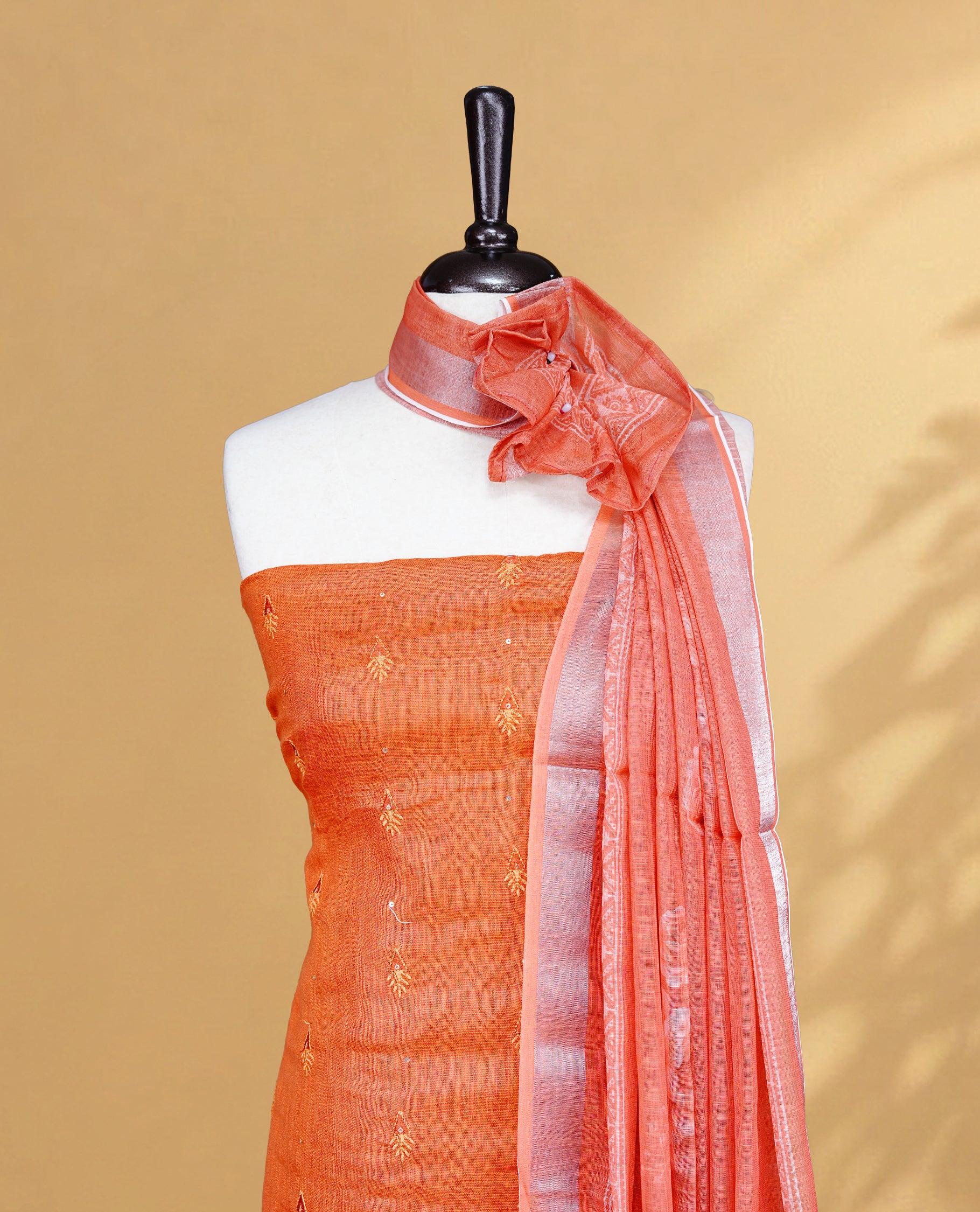Orange Colour Salwar material Featuring Embroidery work on body, paired with Matching Bottom and same Patterned Dupatta.