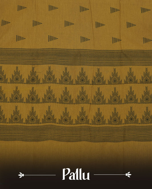 Dark mustard colour poly cotton saree with black temple motifs on the body, paired with a matching pallu with black woven traditional border, and a coordinated all‑over geometric printed blouse piece.