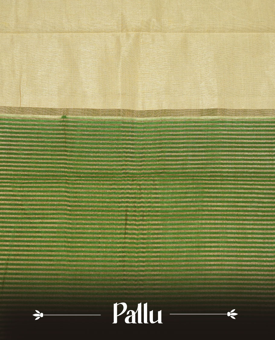 Cream colour tussar saree featuring elegant plain body, contrast Green colour gold zari border and comes with matching blouse piece.