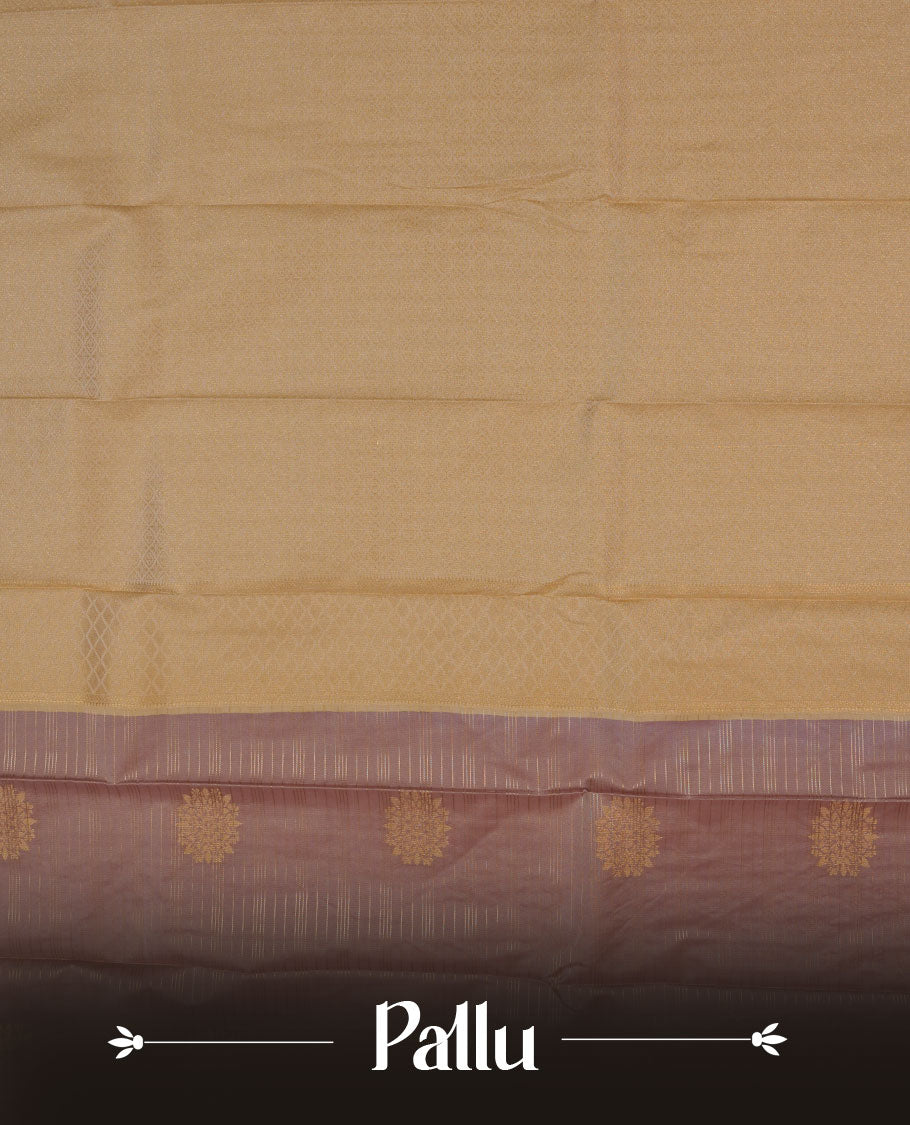 Nude brown colour semi silk saree highlighting gold zari strip pattern  and motifs across body, featuring contrast cream colour border with gold zari pattern, comes with matching blouse .