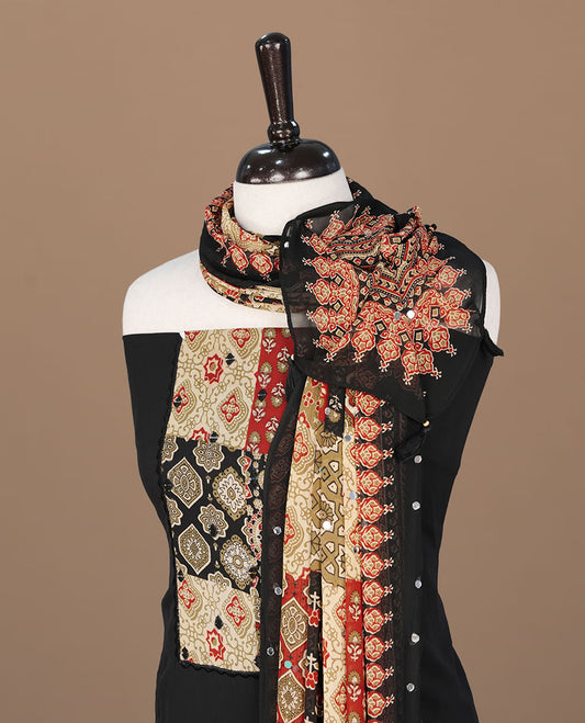 Black colour georgette salwar suit collection featuring plain body enhanced with elegant black bunch kalamkari print on neck yoke, detailed with subtle mirror work , paired with kalamkari printed dupatta with mirror work with santon material bottom.