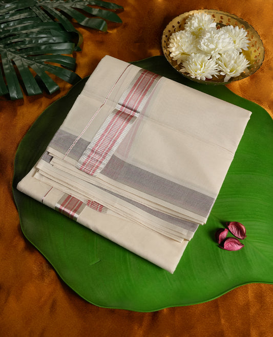 Off white colour cotton dhoti with elegant red and silver striped border. Soft, breathable, and perfect for traditional occasions like weddings, pujas, and festivals. Simple, stylish, and comfortable.