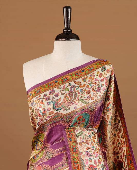 Purple colour Pashmina Saree featuring multicolour geometric and paisley woven body, a contrast multicolour floral & bird border with Purple edging, an ornate paisley woven pallu, paired with a matching blouse.