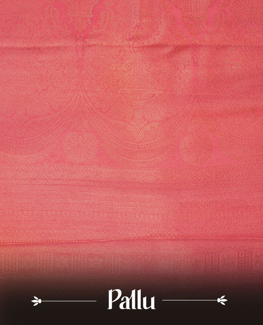 Peachish Pink colour semi soft silk brocade saree featuring delicate floral woven motifs across the body, finished with an intricately detailed traditional pallu and a matching blouse.