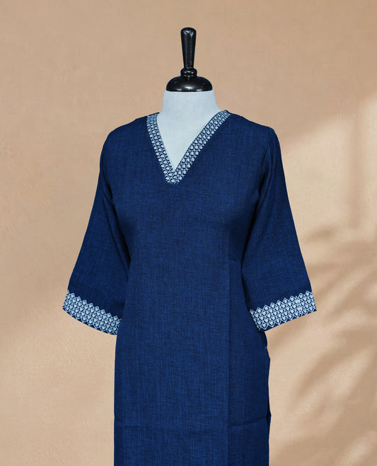 Peacock Blue Kurti featuring digital prints on the bottom, a V-shaped neckline adorned with digital print detailing, and 3/4 sleeves with a matching design.
