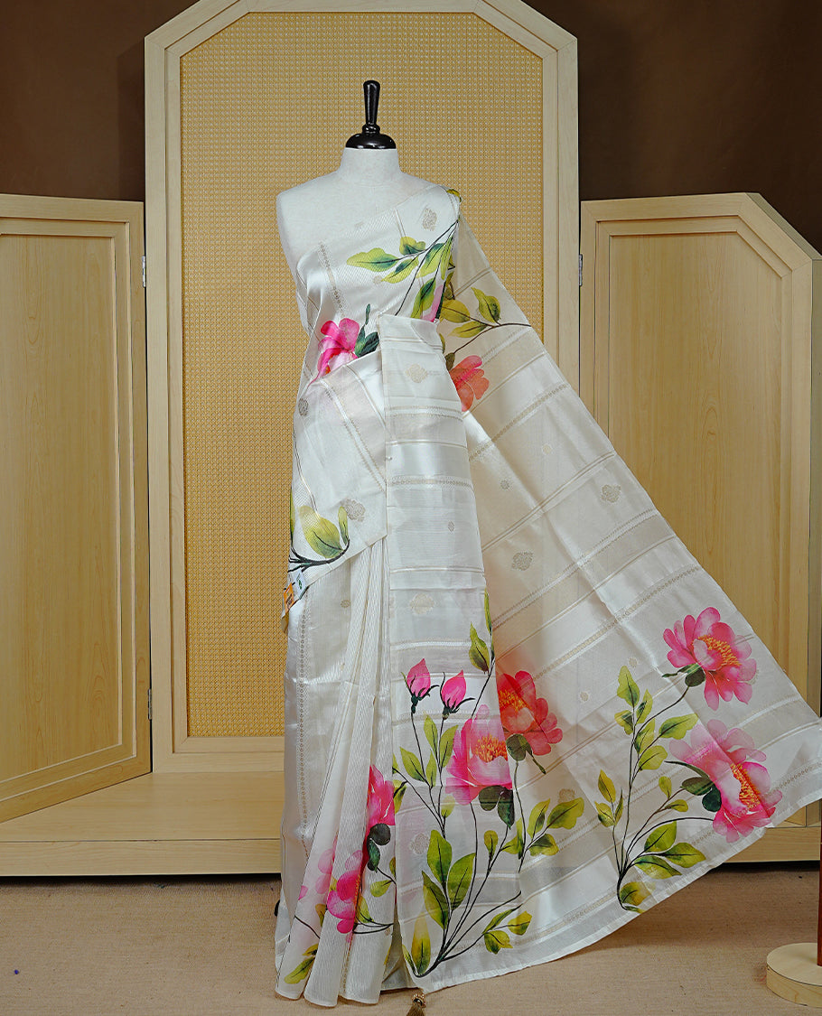 Cream Colour Organza Kerala Saree Featuring Floral Printed Motifs On The  Body & Tassels On The Pallu, Paired With A Matching Blouse Piece.