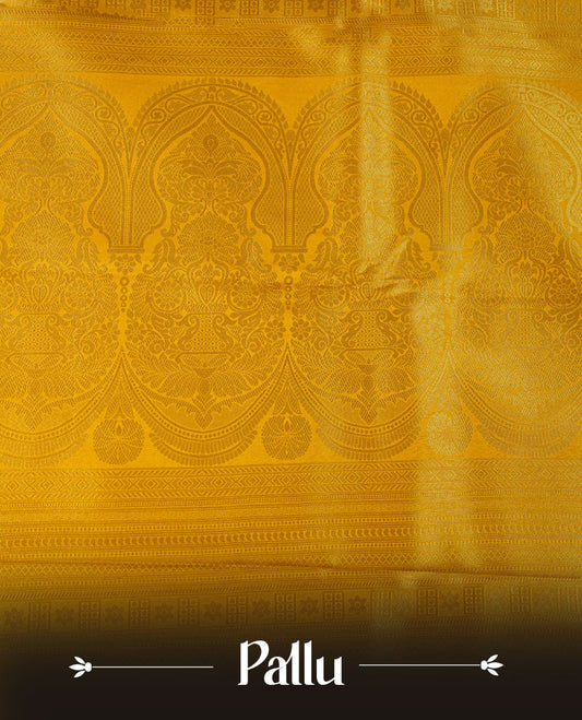 Mustard yellow colour semi soft silk brocade saree featuring subtle self-woven paisley motifs on the body, finished with an intricately woven matching border and pallu, paired with a coordinating blouse piece.