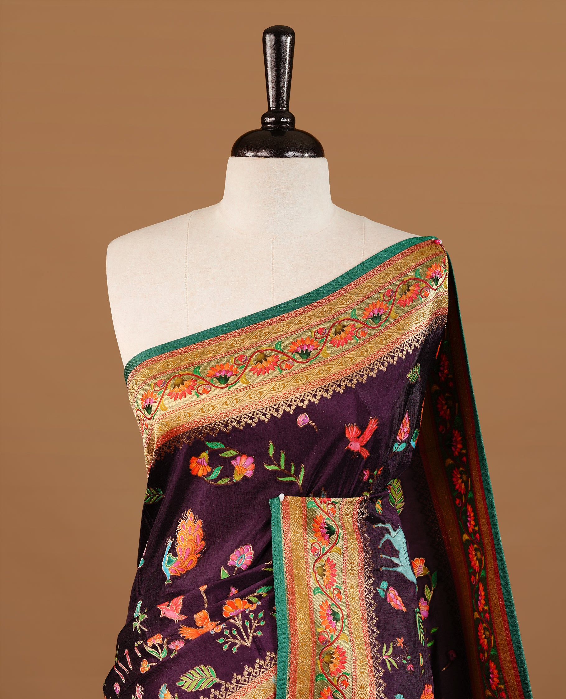 Deep Purple colour Pashmina Saree featuring a floral printed body, a multicolour floral woven border, a rich woven pallu with floral motifs, paired with a matching blouse.