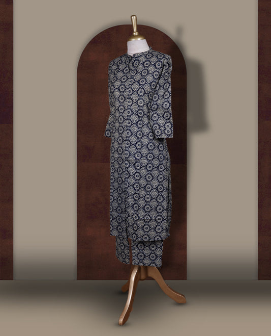 Navy blue colour coord set with floral prints all over,  featuring a smart mandarin collar and 3/4 sleeves, Paired with matching straight pants, it blends elegance and comfort for a chic everyday or casual outing look.