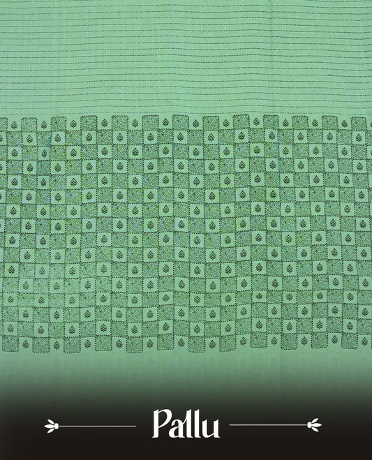 Pastel Green colour poly cotton saree with black vertical dotted line pattern on the body, paired with a matching pallu featuring black zigzag geometric border, and a coordinated all‑over black stylised fleur‑de‑lis printed blouse piece.