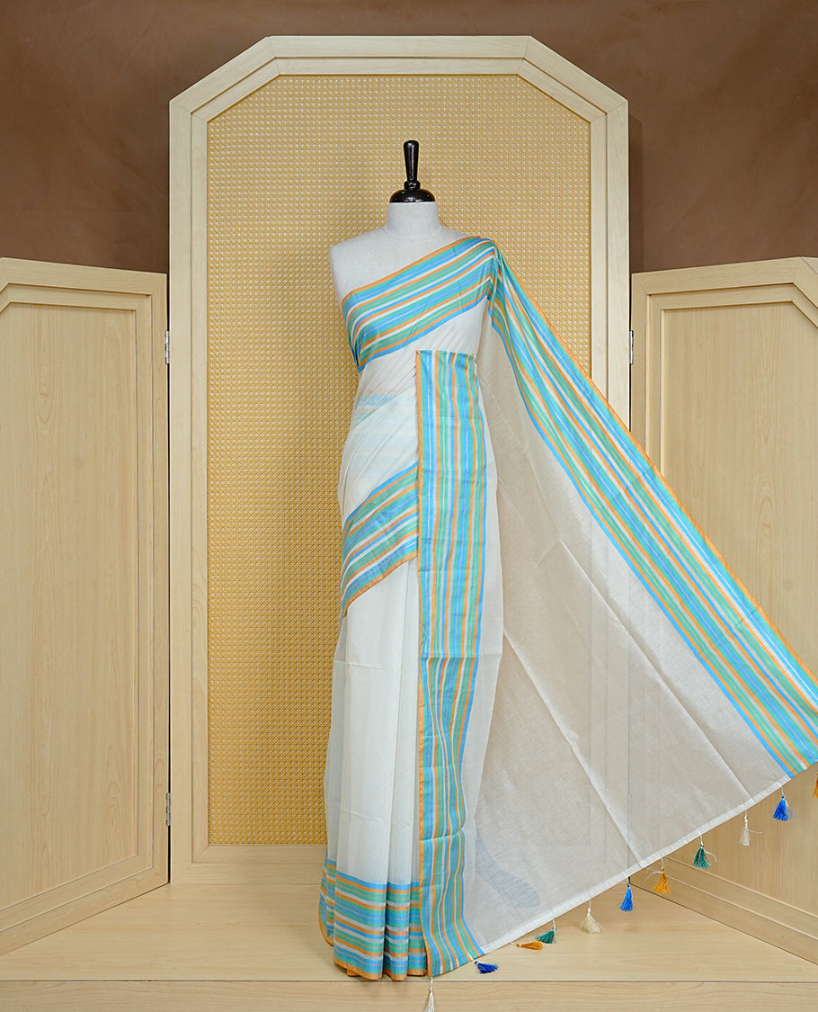 Off white colour semi linen saree featuring Elegant Plain body, complemented by contrast Blue, green Mustard colour with strip border, comes with matching blouse piece.