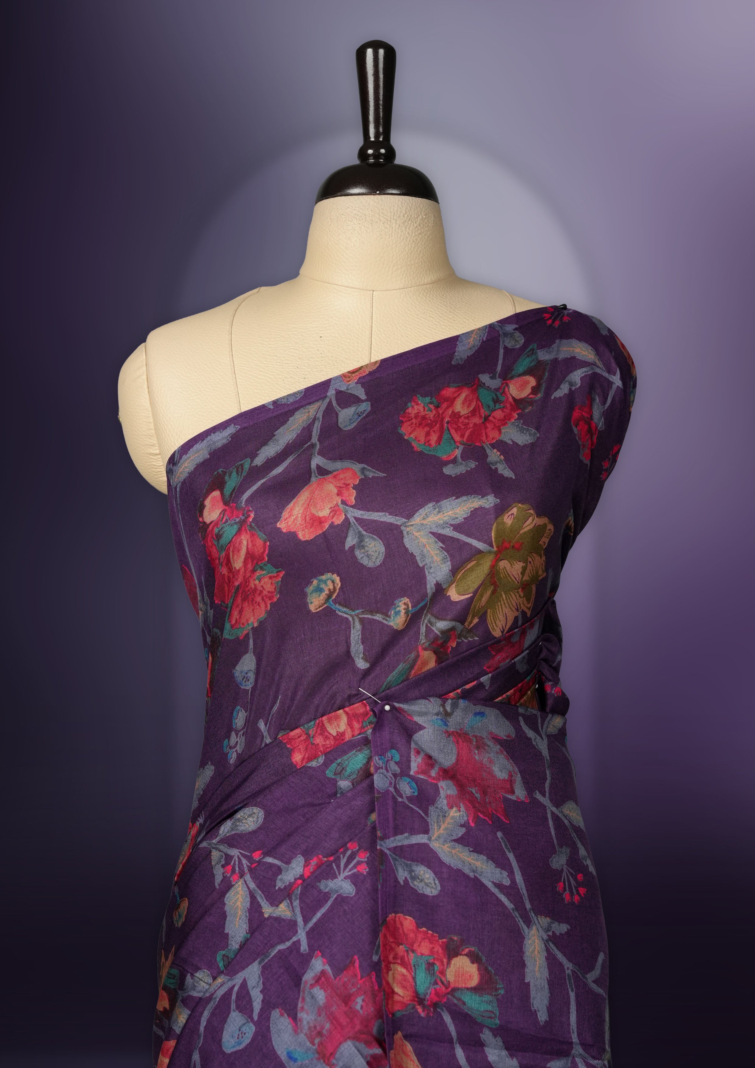 Purple colour saree enhanced with a vibrant multiple colour floral prints on body & pallu, and comes with a matching blouse.