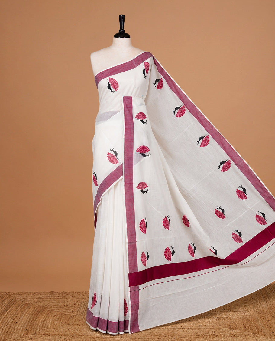Cream colour Cotton Kerala saree Featuring Classy Plain body for Effortless Elegance, enhancing Maroon with Peacock Printed border, paired with matching blouse piece.