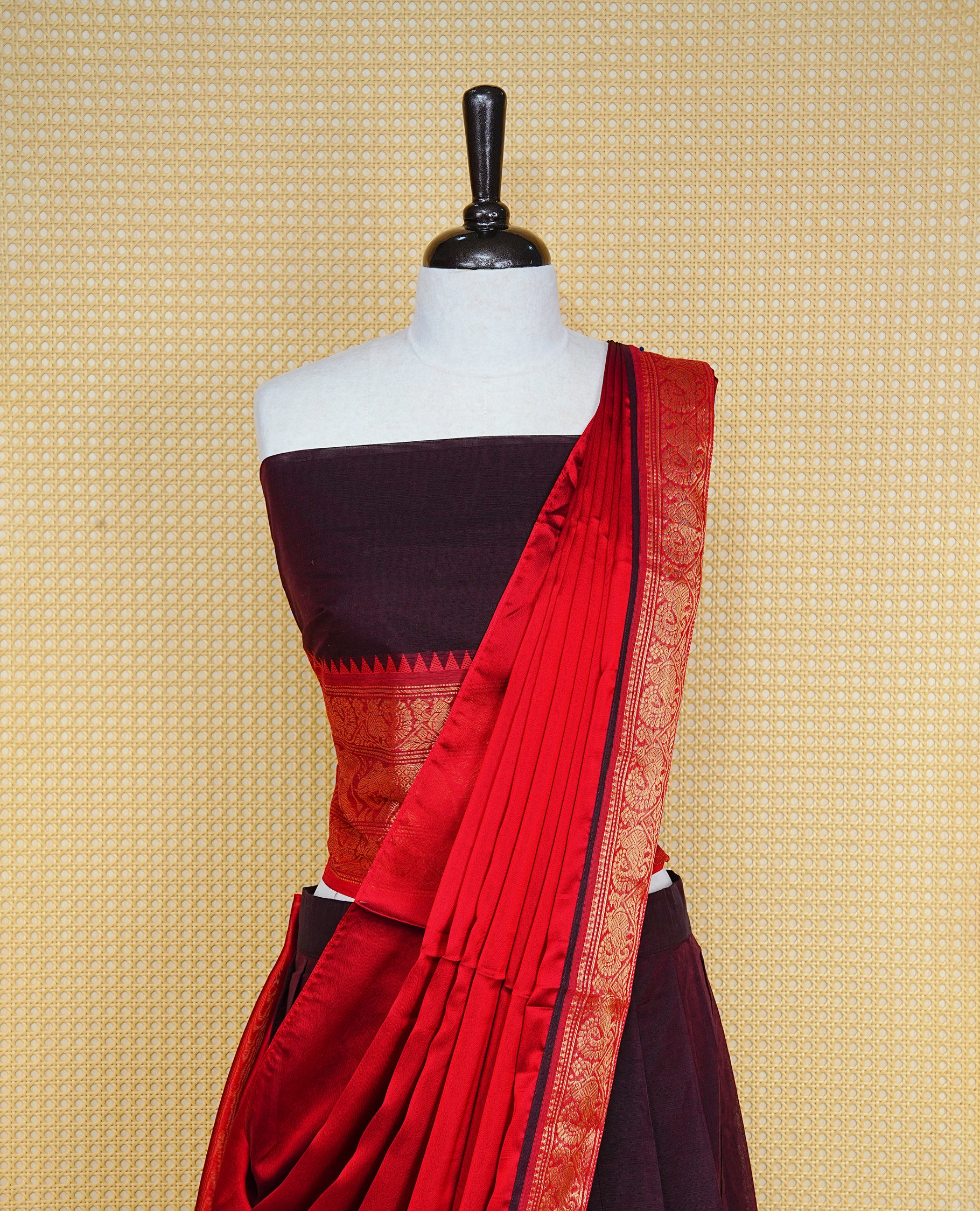 Dark chocolate colour Semi Stitched Dhavni set Featuring Dark Chocolate Skirt With Contrast Red colour with Zari border, paired with UnStitched Blouse & Elegant Dupatta.