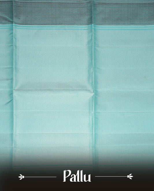 Aqua & grey colour soft silk saree featuring gold zari stripes on body, complemented by self colour border and tassel at pallu, paired with matching blouse piece.