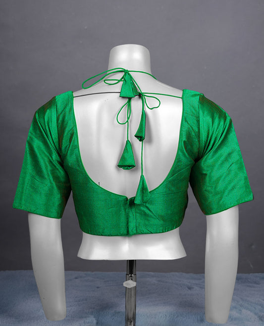 Bright Green colour silk padded readymade blouse with elbow-length sleeves, a V-neck front, and a deep U-back with tie-up dori.