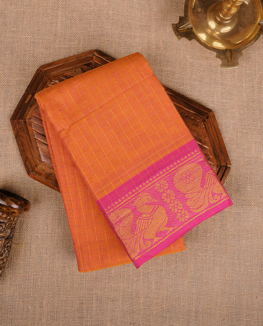 Orange colour chettinad cotton saree featuring gold zari check patterned body, contrast pink colour with traditional gold zari border paired without blouse.