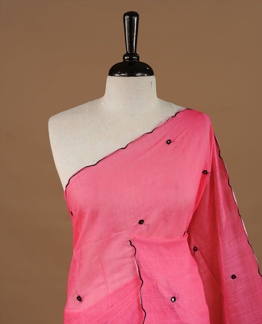 Pink colour Semi Linen saree featuring mirror work with intricate thread detailing, enhanced by a stylish scallop border. Comes without a blouse piece.