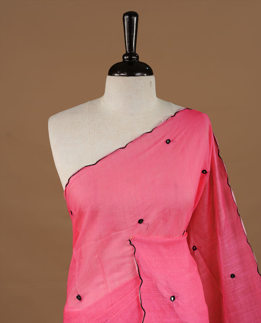 Pink colour Semi Linen saree featuring mirror work with intricate thread detailing, enhanced by a stylish scallop border. Comes without a blouse piece.
